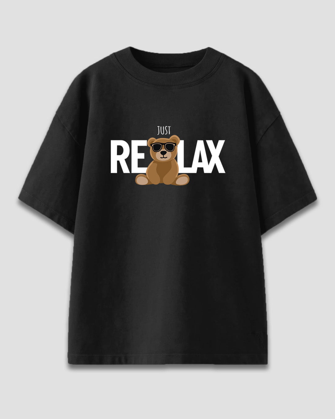 Black Just Relax Oversized T-Shirt – DKY black oversized tee with bear graphic wearing sunglasses, flat lay