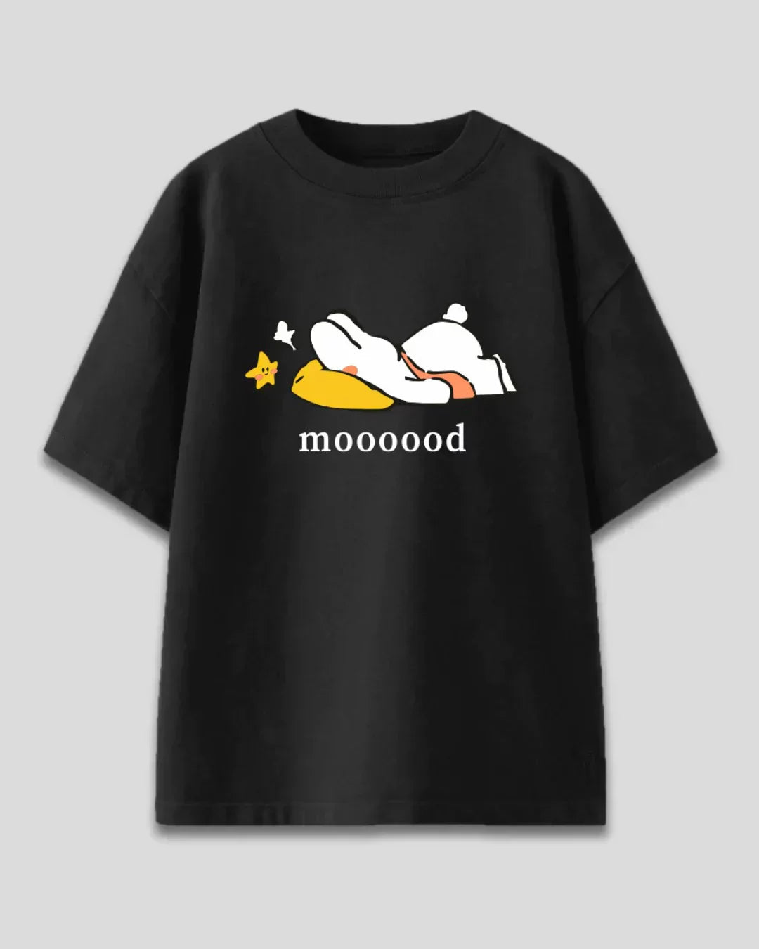 Black Moood Oversized T-Shirt - graphic print of a white sleeping figure on a yellow pillow with a star, flat lay