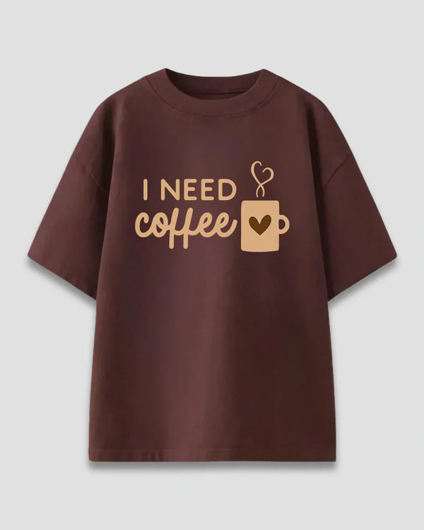 Brown I Need Coffee Oversized T-Shirt – brown tee with I Need Coffee graphic and heart mug, flat lay
