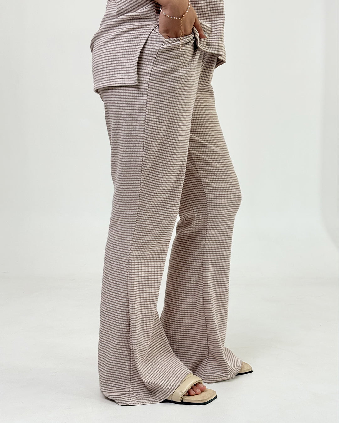 Brown Ribbed Co-Ord Set – brown ribbed wide-leg pants with matching top, worn by model
