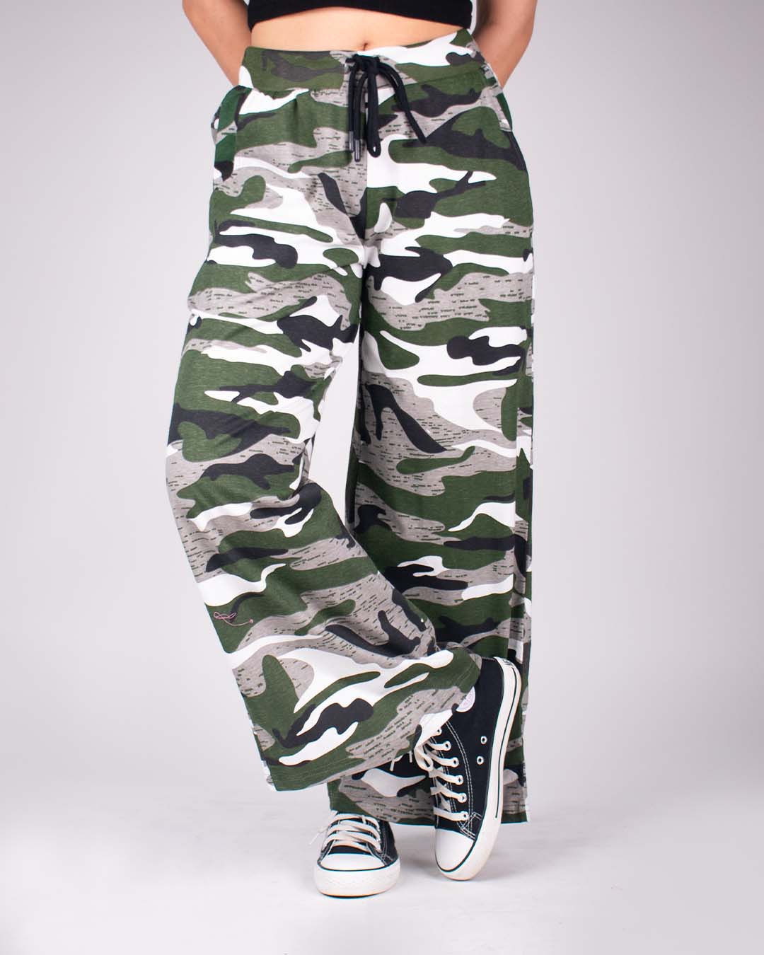 Camo Pajama – camouflage print, loose-fit pajama pants with drawstring waist, worn by model