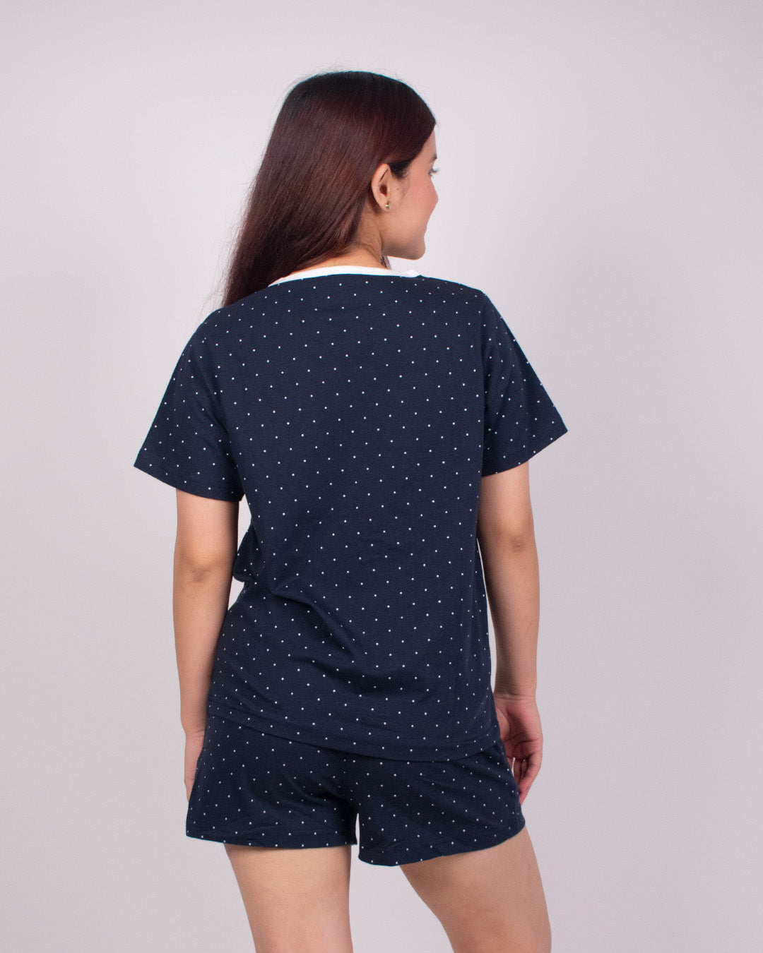 Confetti Cotton Shorts Set – navy polka-dot two-piece with short-sleeve top and matching shorts, worn by model