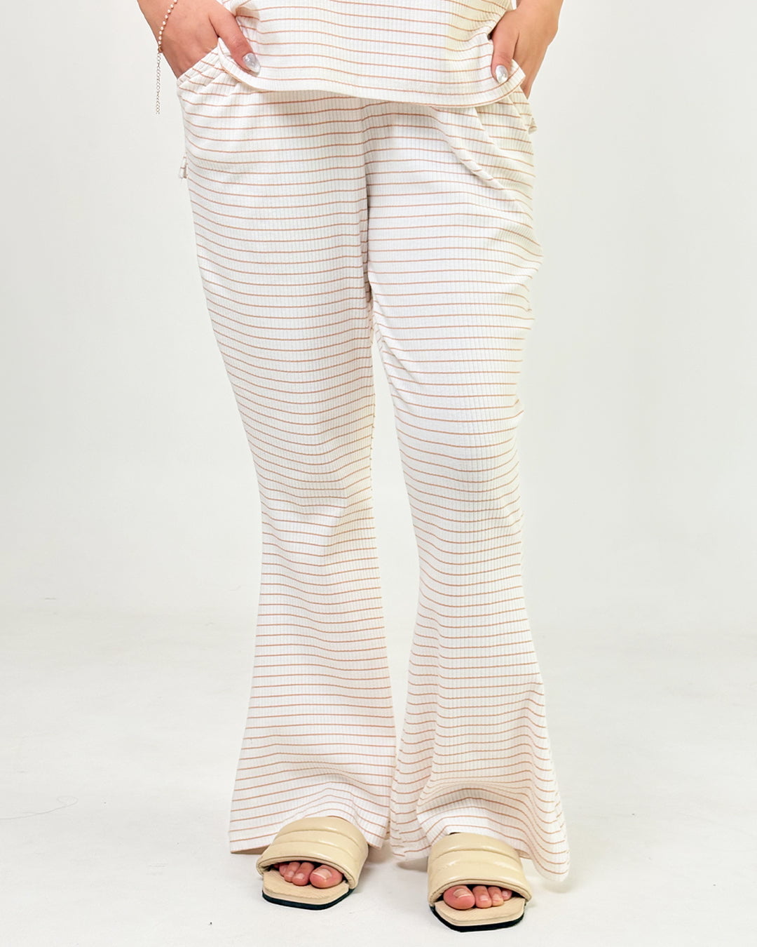 Cream Ribbed Co-Ord Set – cream striped ribbed two-piece with wide-leg pants, worn by model