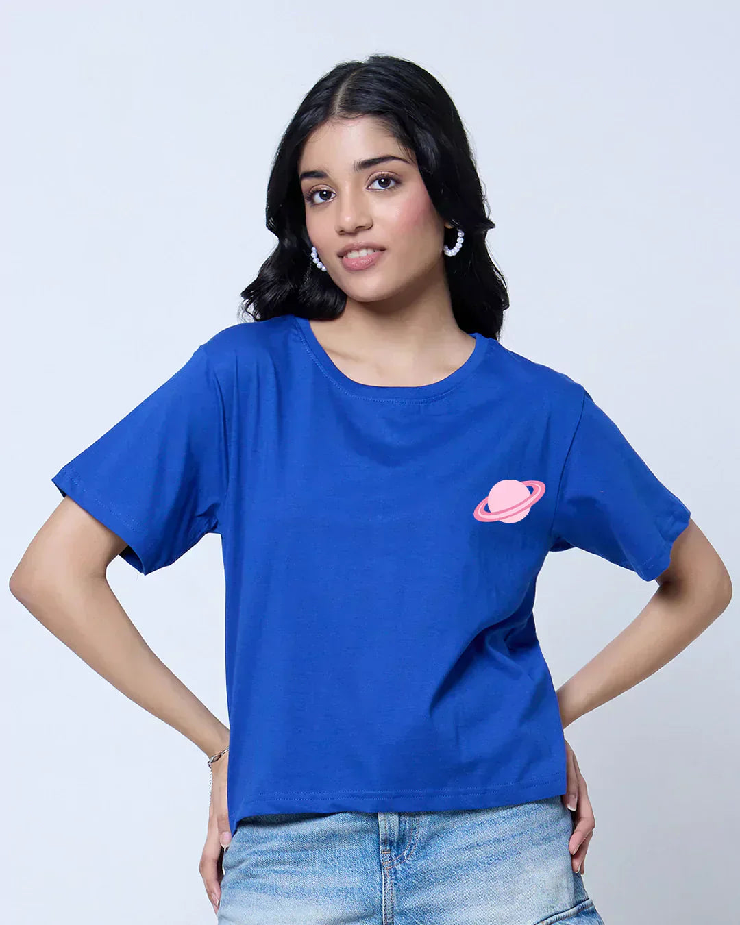 Create Your Own World RB Boxy T-Shirt – royal blue DKY boxy tee with pink planet graphic worn by model