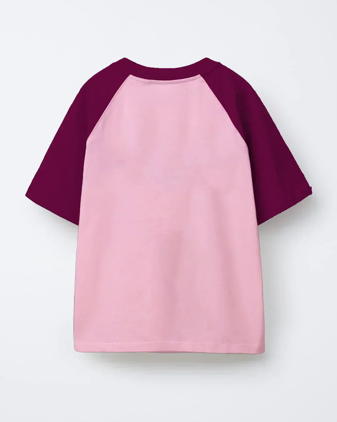 Dream Raglan Oversized T-Shirt – pink body with burgundy raglan sleeves, color-block tee shown in flat lay