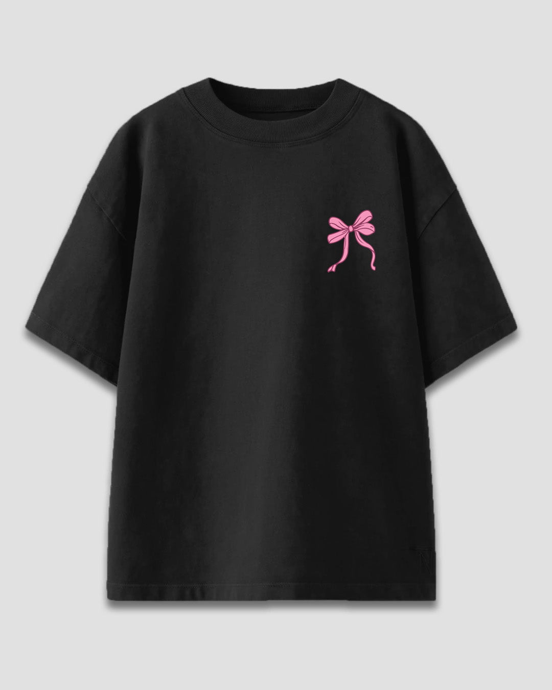 Faith Over Fear Oversized T-Shirt – black OS graphic tee with a pink bow on the chest.