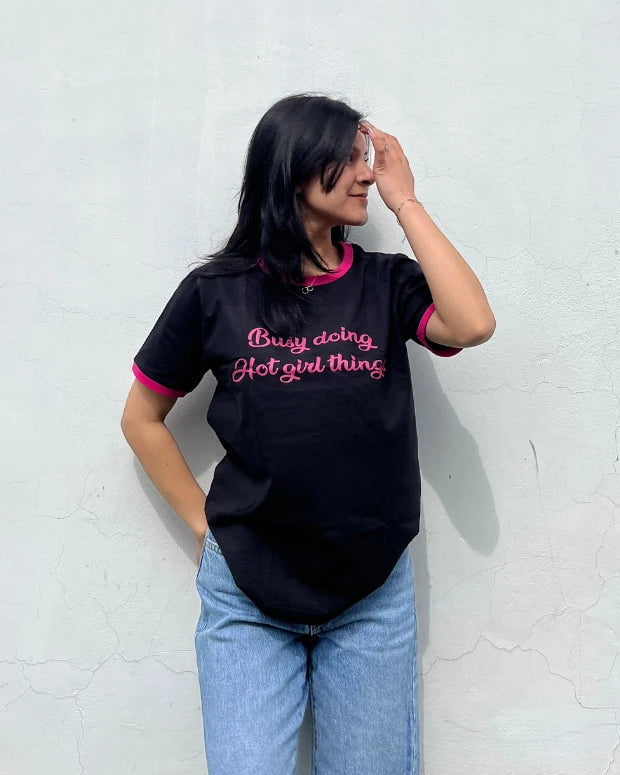 Hot Girl Things Tap Out T-Shirt – black regular tee with pink trim and pink script text, worn by model