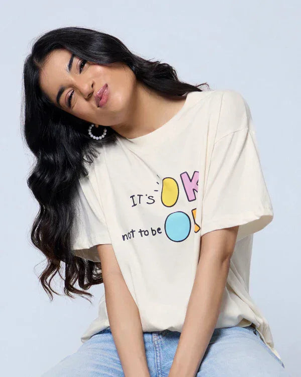 It's Ok Not To Be Ok Oversized T-Shirt - beige oversized tee with colorful graphic print, worn by model