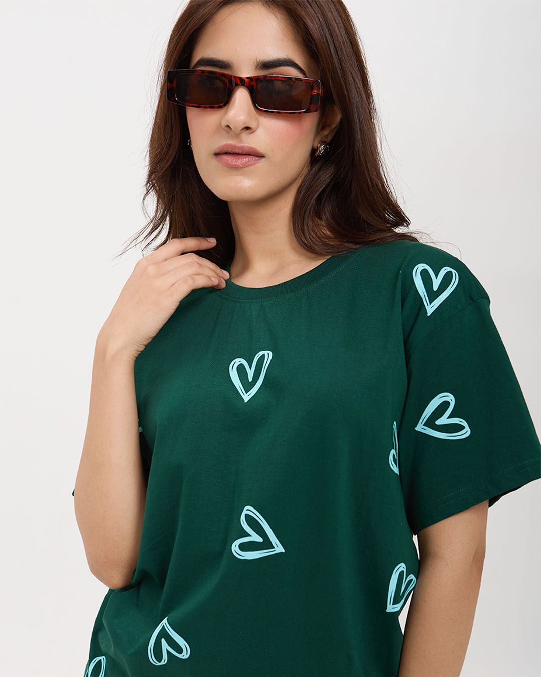 Jade Lover Oversized T-Shirt – dark green with teal heart prints, DKY graphic tee worn by model