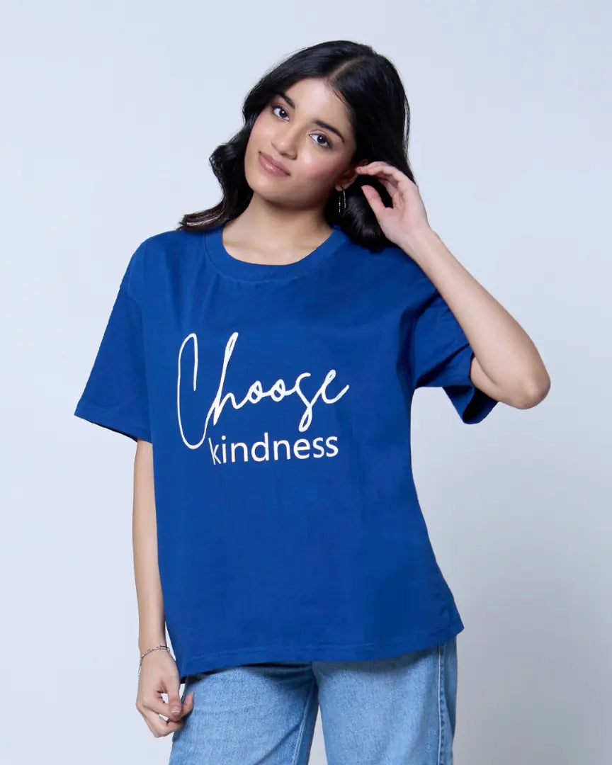 Kindness Oversized T-Shirt – blue oversized short-sleeve shirt with white Choose kindness text, worn by model