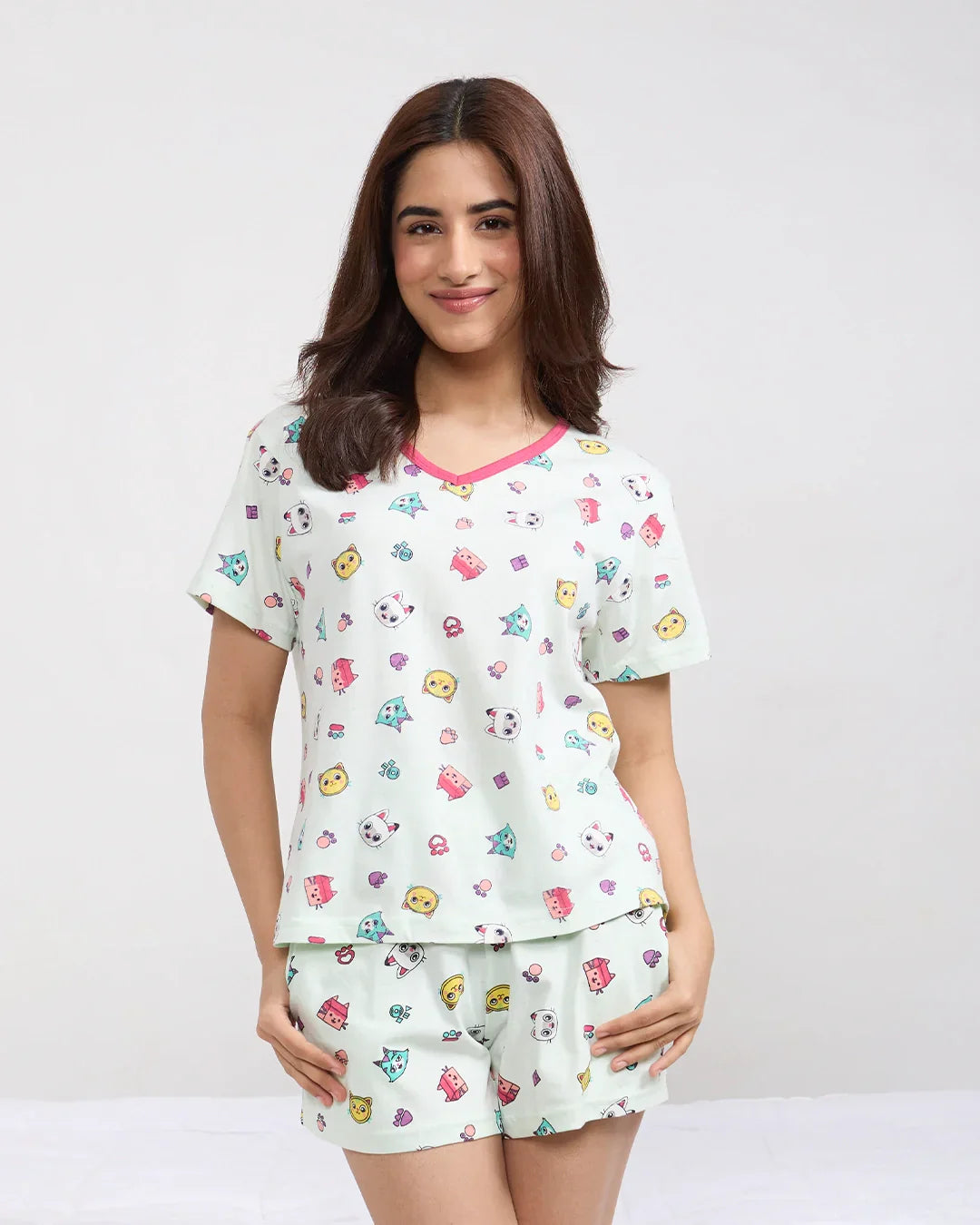 DKY Kitty Cotton Shorts Set – mint green short-sleeve top and matching shorts with playful cat prints, worn by model