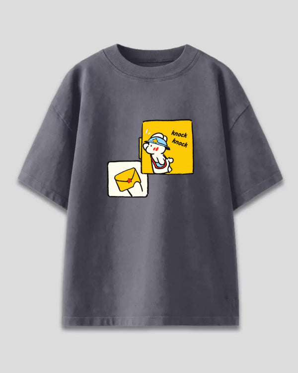 Knock Rabbit Oversized T-shirt – dark gray OS graphic tee with a yellow bunny and envelope print, shown in flat lay