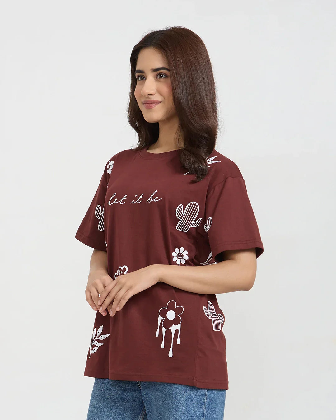Let It Be Oversized T-Shirt - burgundy DKY shirt with white graphic flowers and cacti, worn by model