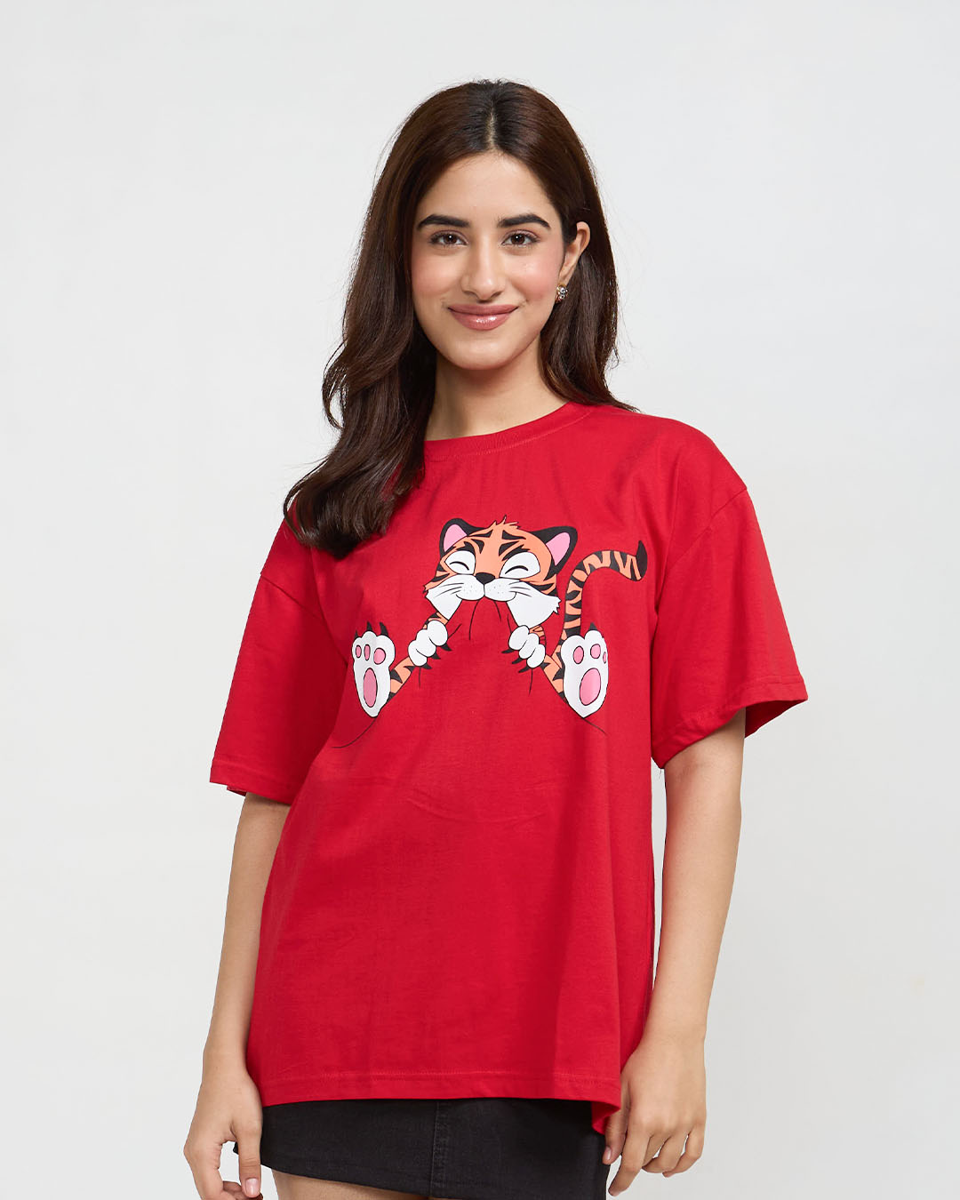 Little Happy Little Hungry Oversized T-Shirt – red oversized graphic tee featuring a cartoon tiger, worn by model