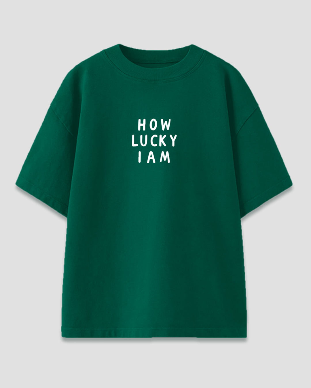 Lucky Me Oversized T-Shirt – green graphic tee with white HOW LUCKY I AM print on front