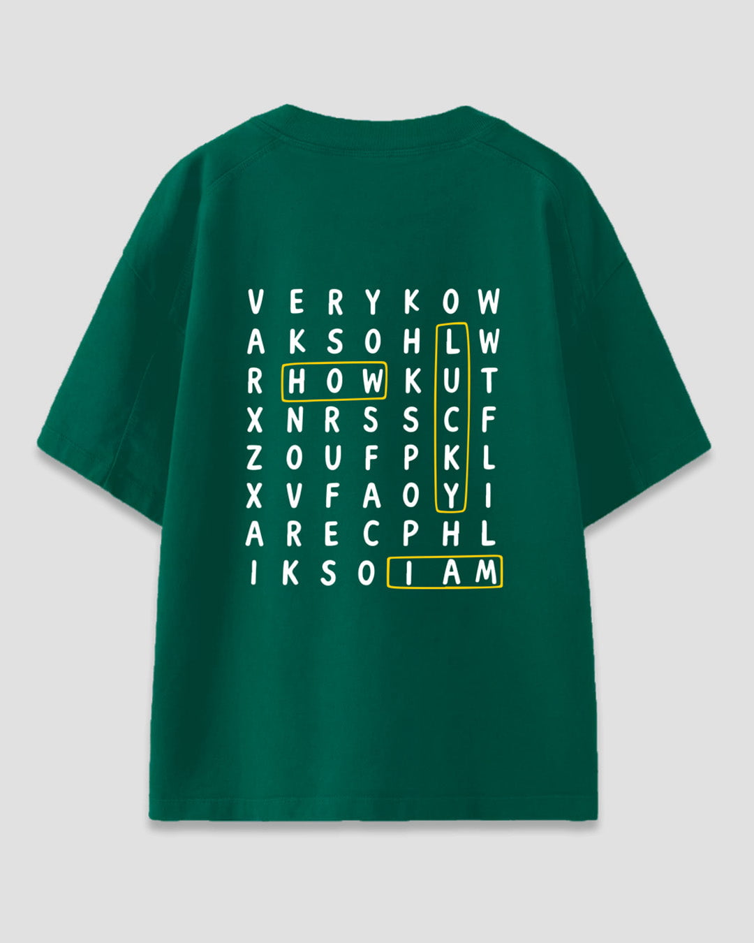 Lucky Me Oversized T-Shirt – green graphic tee with white letter-grid design and yellow highlights.