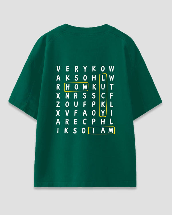 Lucky Me Oversized T-Shirt – green graphic tee with white letter-grid design and yellow highlights.