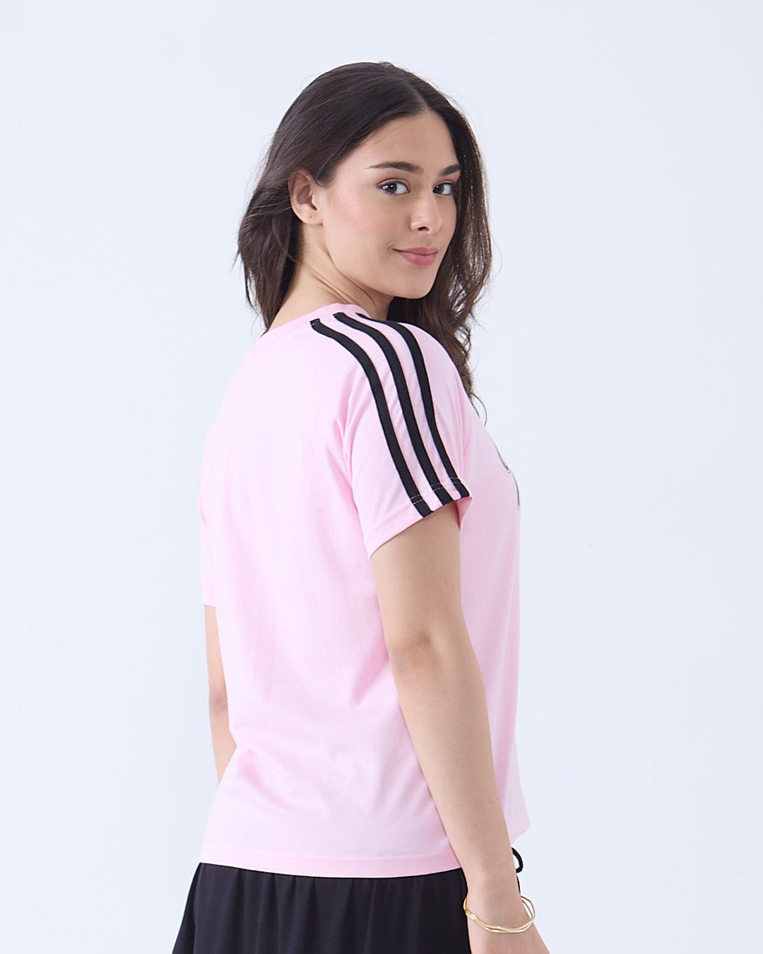 Michigan Curve T-Shirt – pink regular tee with black triple-stripe sleeves, worn by model