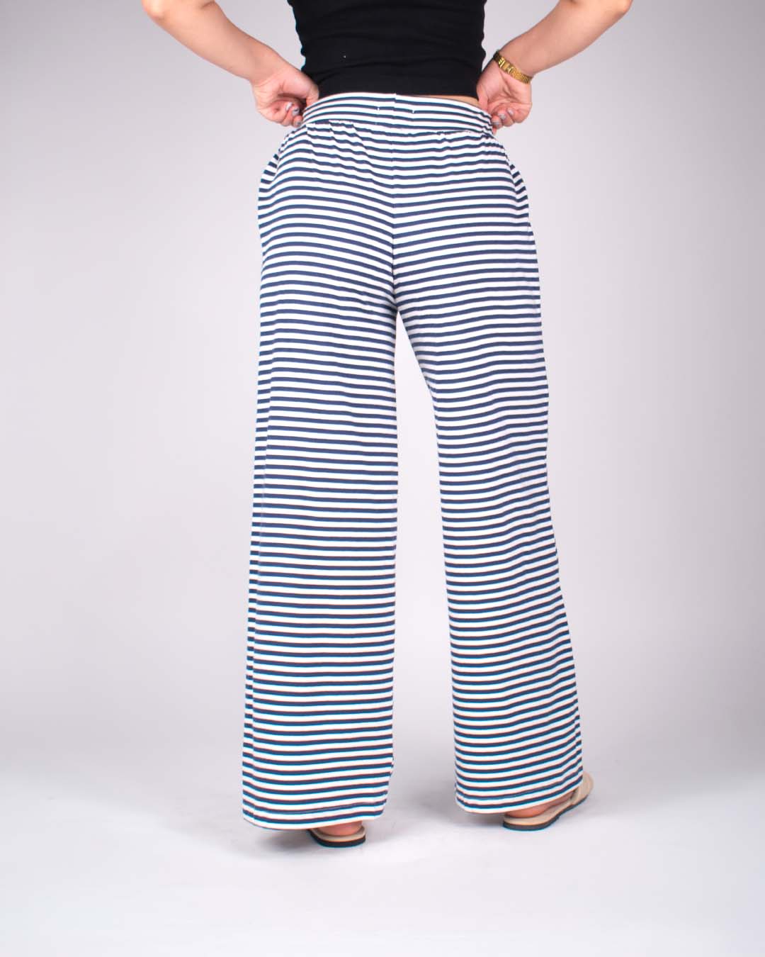Midnight Pajama by DKY – navy and white striped wide-leg pajama pants worn by model