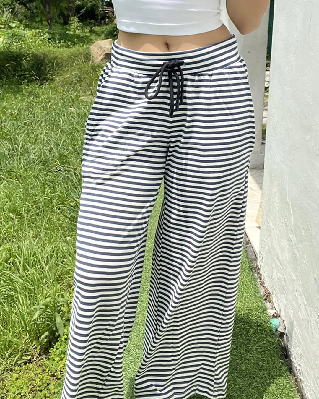 Midnight Pajama pants - navy and white striped, wide-leg with drawstring waist, worn by model