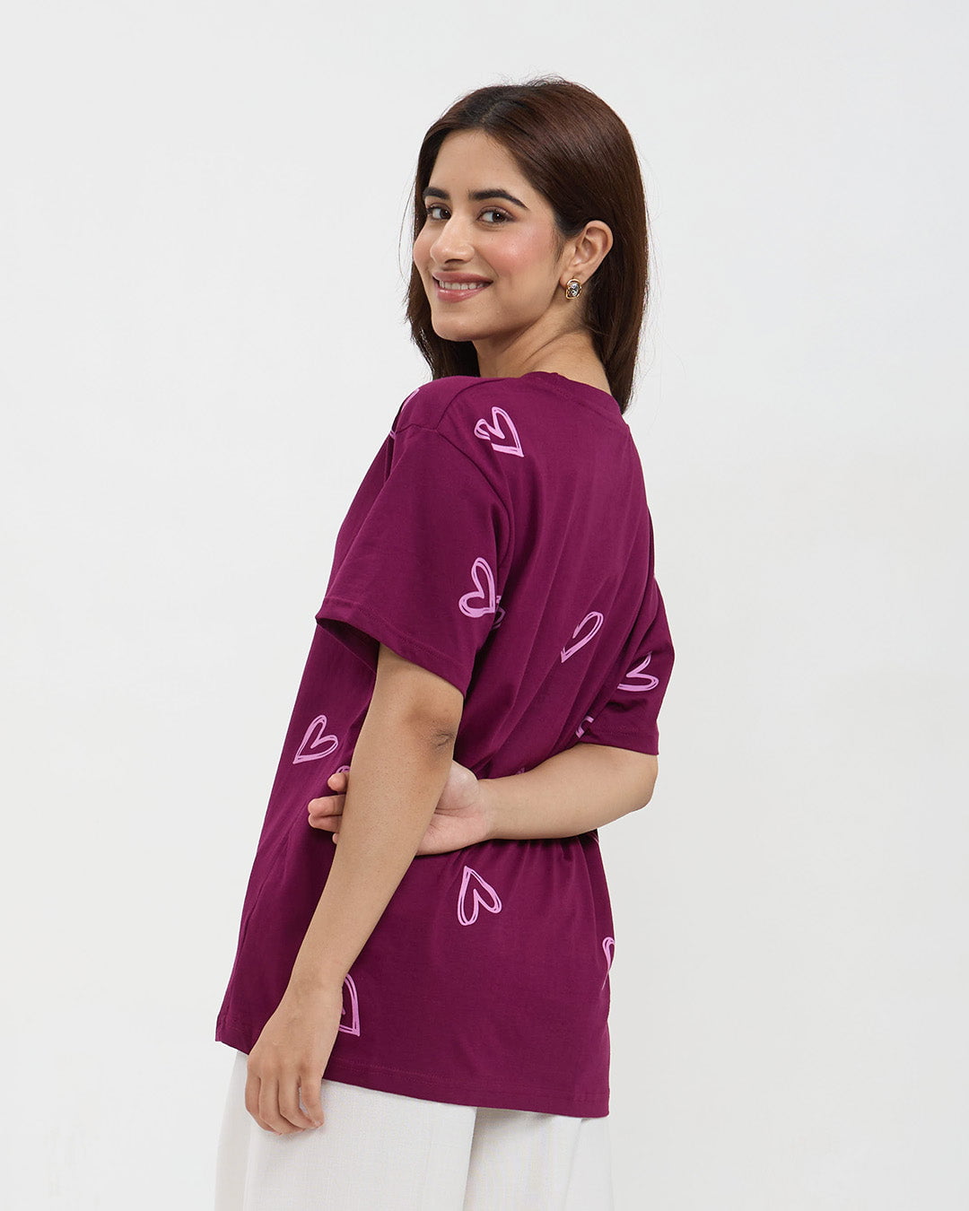 Mulberry Lover Oversized T-Shirt – magenta graphic tee with pink heart outlines, worn by model.