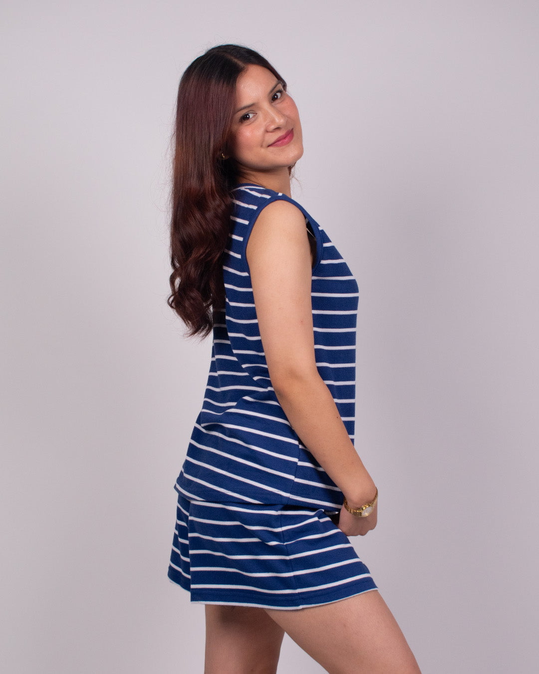 NB Luna Co-Ord Set – blue and white striped sleeveless top with a matching skirt, worn by model