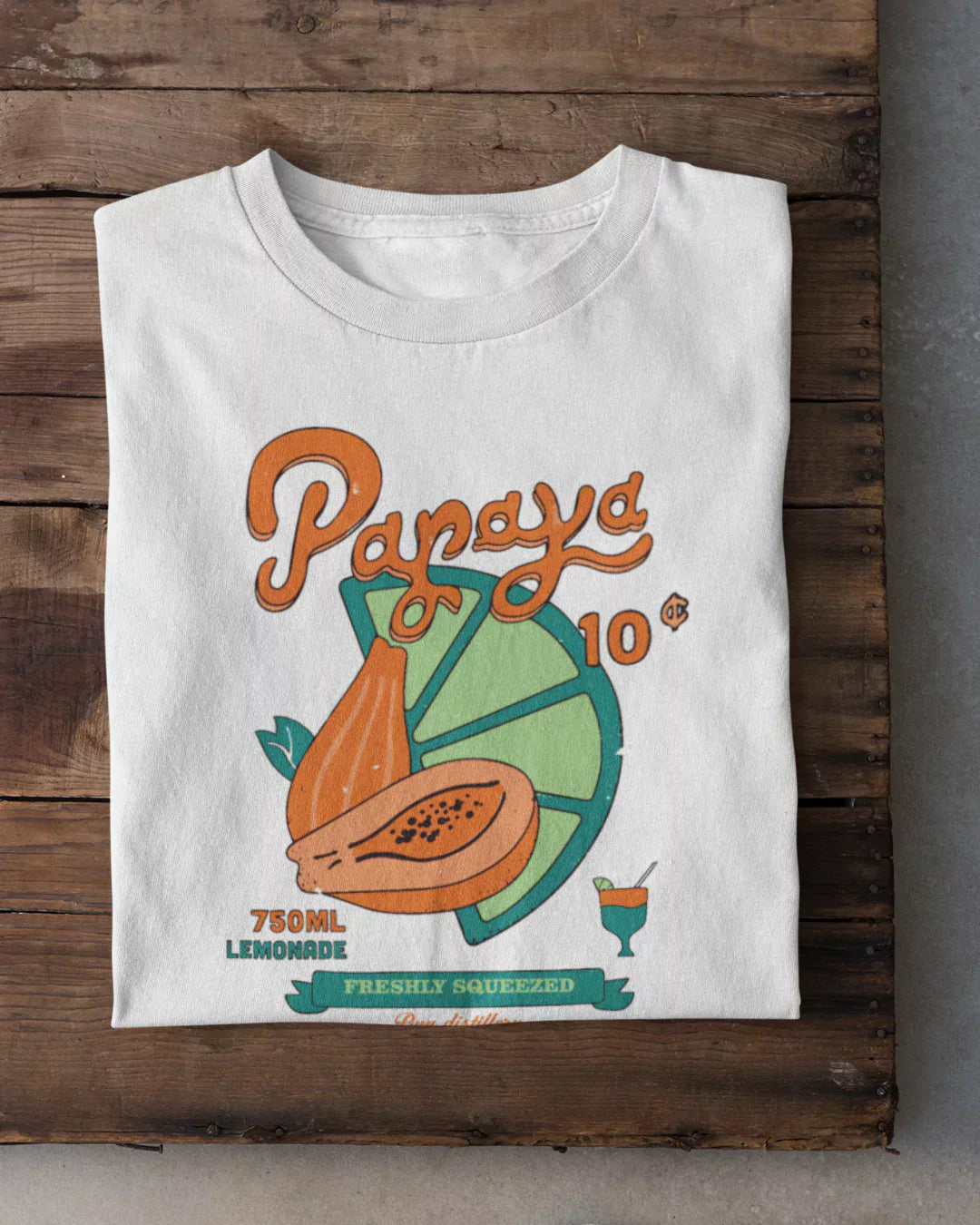 Papaya T-Shirt – white regular tee with orange papaya and lime wedge, teal accents, shown flat lay