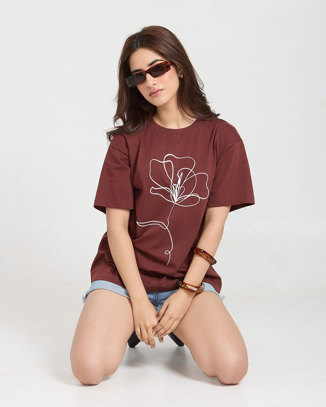Phool Oversized T-Shirt - maroon oversized tee with a white line-drawn flower design, worn by model