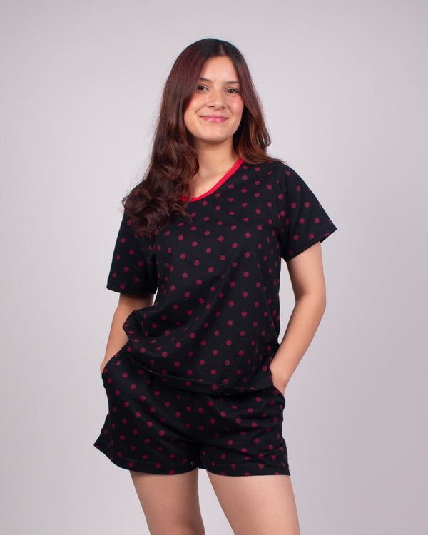 Polka Dots Cotton Shorts Set – black with red polka dots, matching short-sleeve top and shorts worn by model