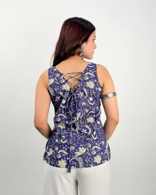 Purple Kiara Short Kurti – purple printed sleeveless kurti with lace-up back, worn by model