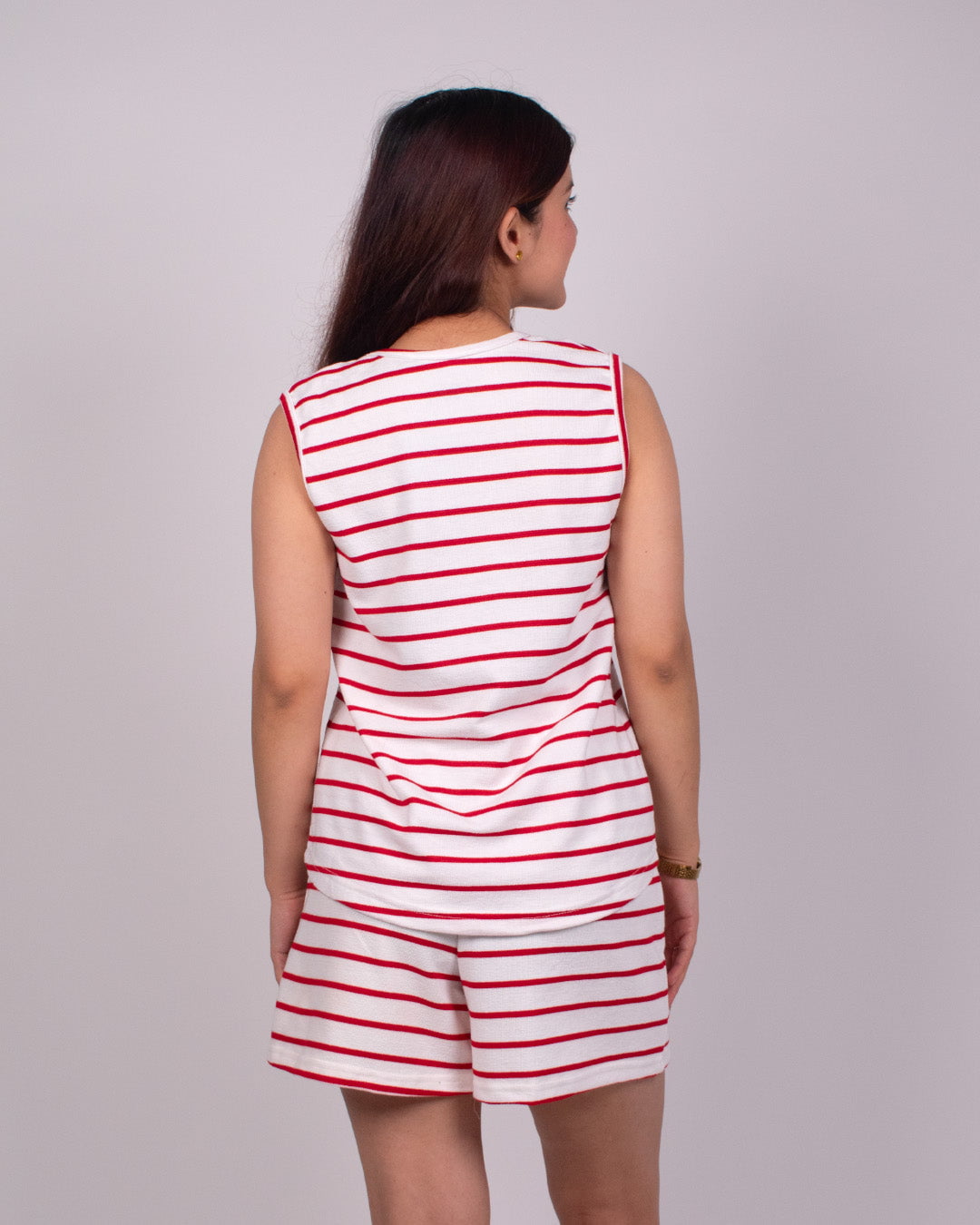 Red Luna Co-Ord Set by DKY – red and white striped sleeveless top with matching shorts, worn by model.