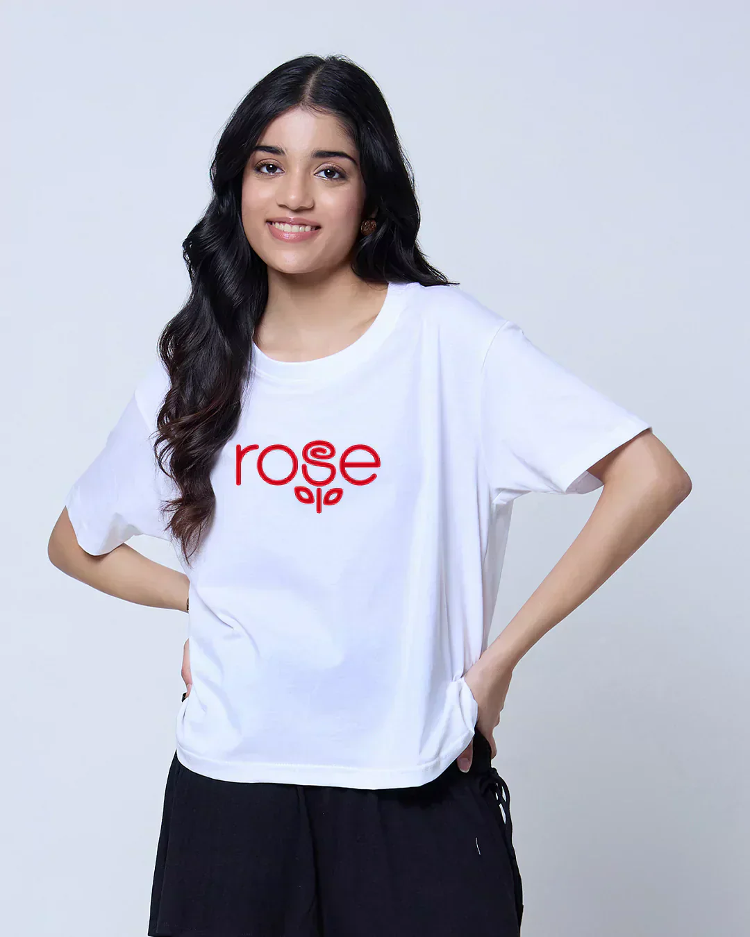 Rose Boxy Oversize T-Shirt DKY – white boxy oversized tee with red rose text graphic worn by model