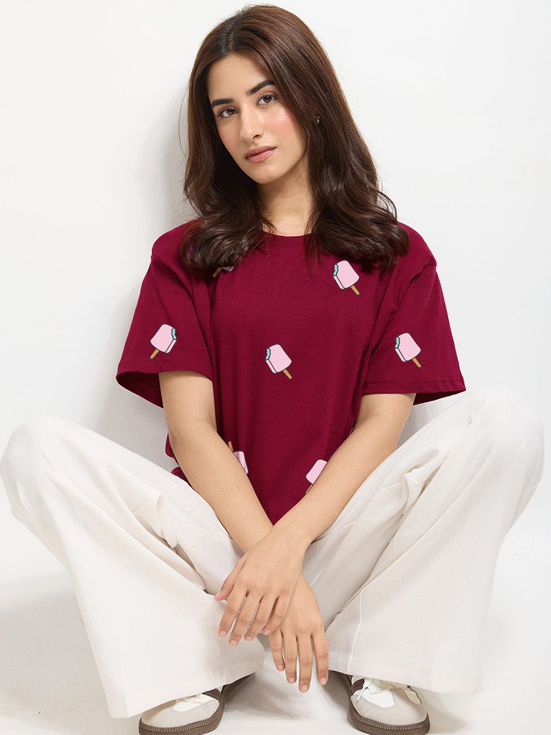 Ruby Popsicles Oversized T-Shirt – maroon oversized tee with pink popsicle prints, worn by model
