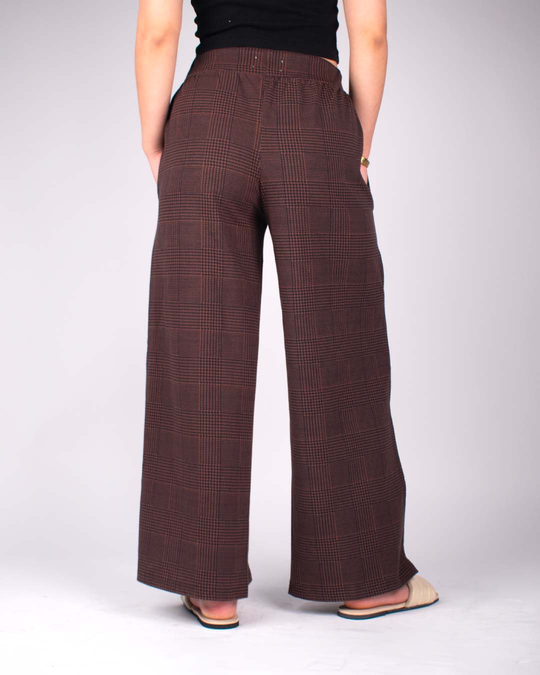 Rustic Pajama – brown plaid wide-leg, high-waisted pants by DKY, shown on a model from back view