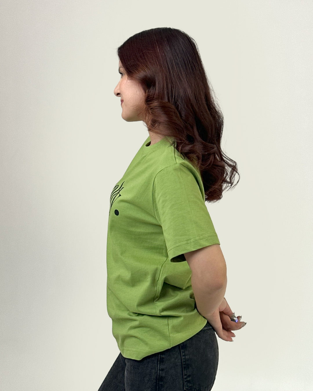 Salty T-Shirt by DKY – lime green regular tee worn by model with a black graphic on the chest