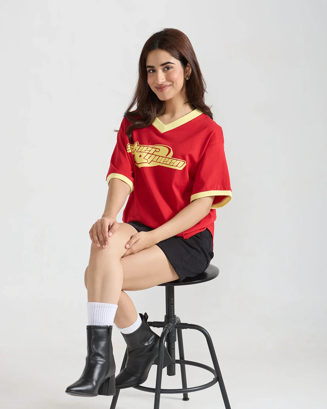 Silver Queen Tap-Out V-Neck Oversize T-Shirt – red with yellow trim, oversized V-neck tee featuring beige Tap-Out graphic, worn by model