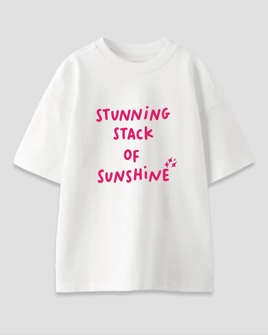 Stack Of Sunshine Oversized T-Shirt – white DKY OS Graphics tee with pink STUNNING STACK OF SUNSHINE text, flat lay