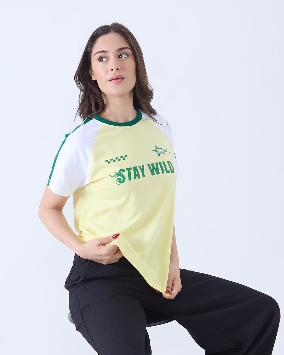 Stay Wild Edgy T-Shirt – pale yellow body with white sleeves, relaxed fit Regular Tee WS featuring Stay Wild graphic, worn by model