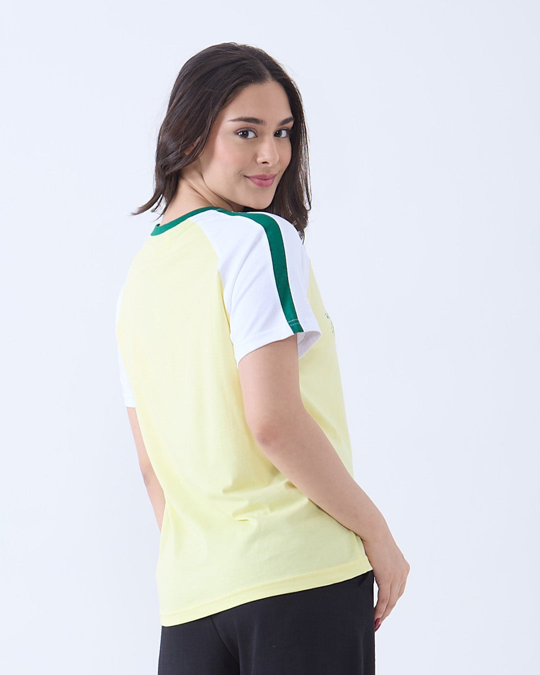 Stay Wild Edgy T-Shirt - yellow body with white sleeves and green stripe, worn by model