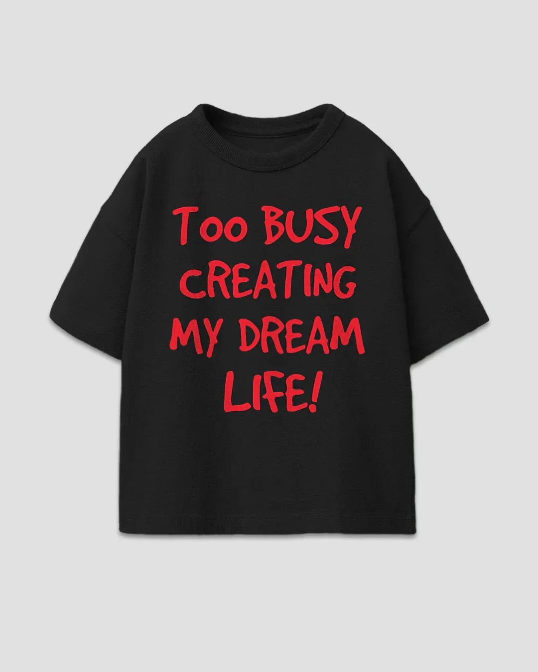 Too Busy Boxy Oversize T-Shirt black boxy OS minimal with red slogan text TOO BUSY CREATING MY DREAM LIFE, flat lay