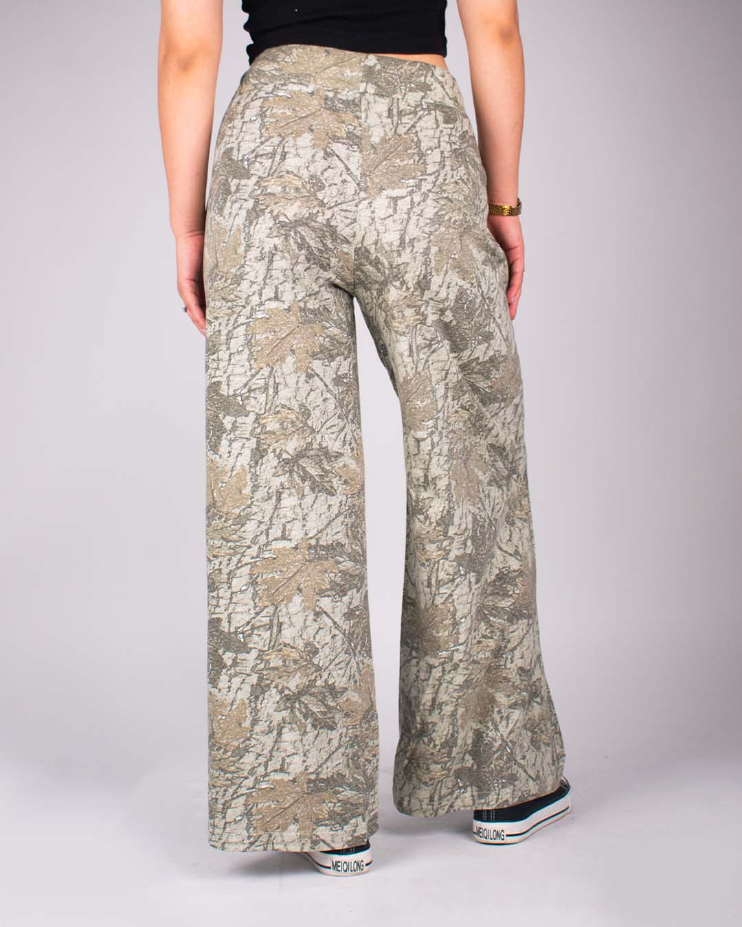 Treetide Pajama pants – beige and gray leaf print, wide-leg relaxed fit worn by model