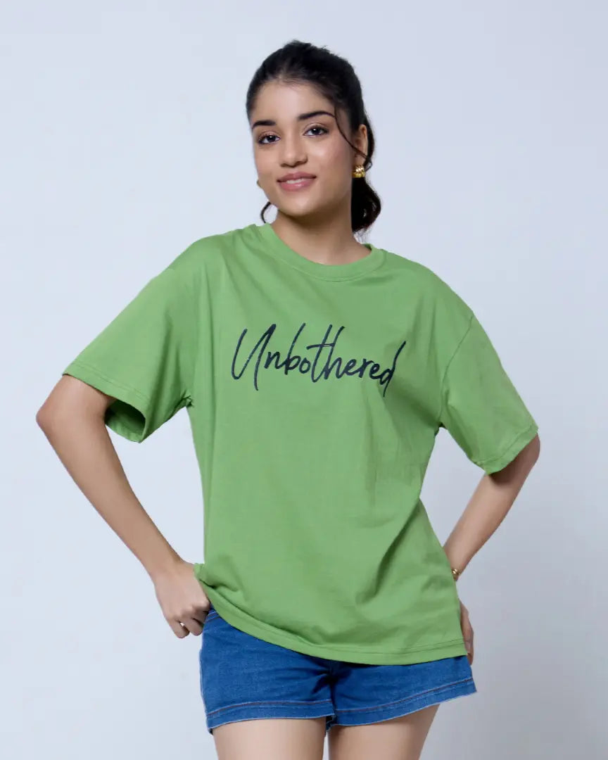 Unbothered Oversized T-Shirt in lime green with a loose fit DKY shirt featuring Unbothered script worn by model