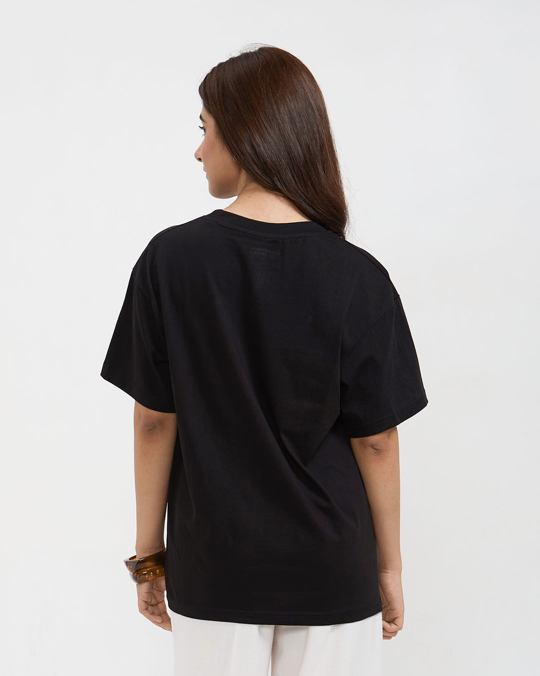 Vintage Coffee Oversized T-Shirt – black oversized tee with plain design, shown on a model (back view)