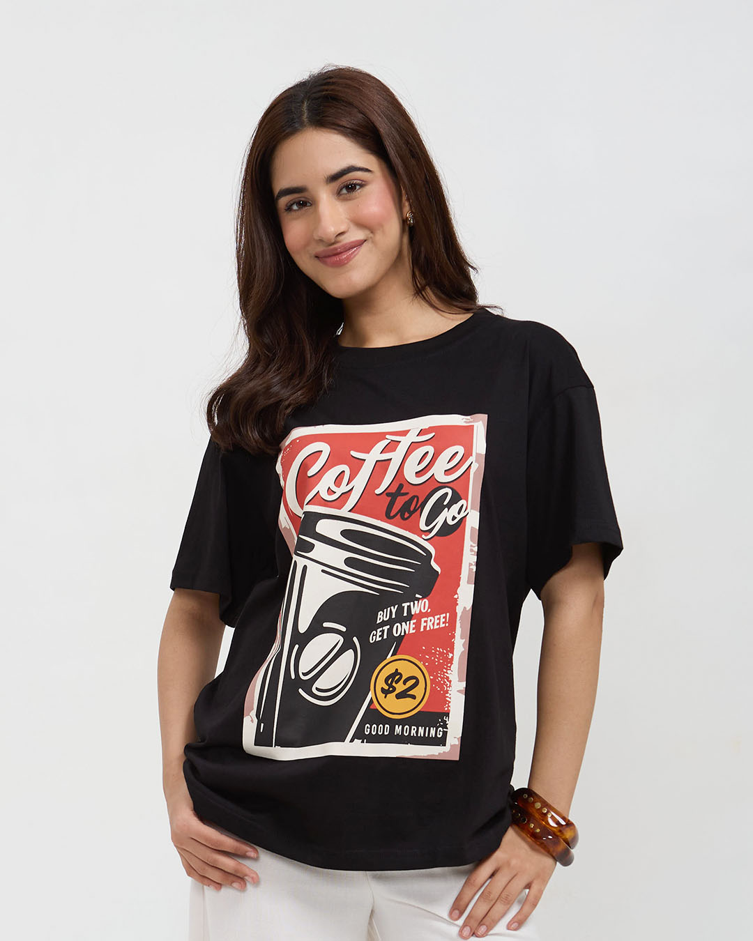 Vintage Coffee Oversized T-Shirt – black OS graphic tee with retro coffee cup print, worn by model
