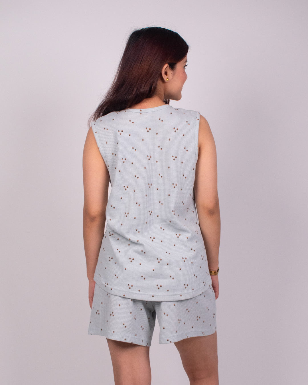 Walnut Luna Co-Ord Set – light blue sleeveless top and shorts with brown dot print, worn by model