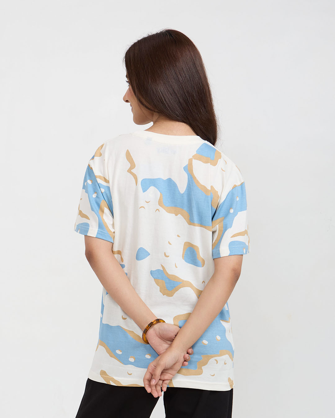 Wavy Oversized T-Shirt – blue and tan wave print on white fabric, DKY shirt worn by model
