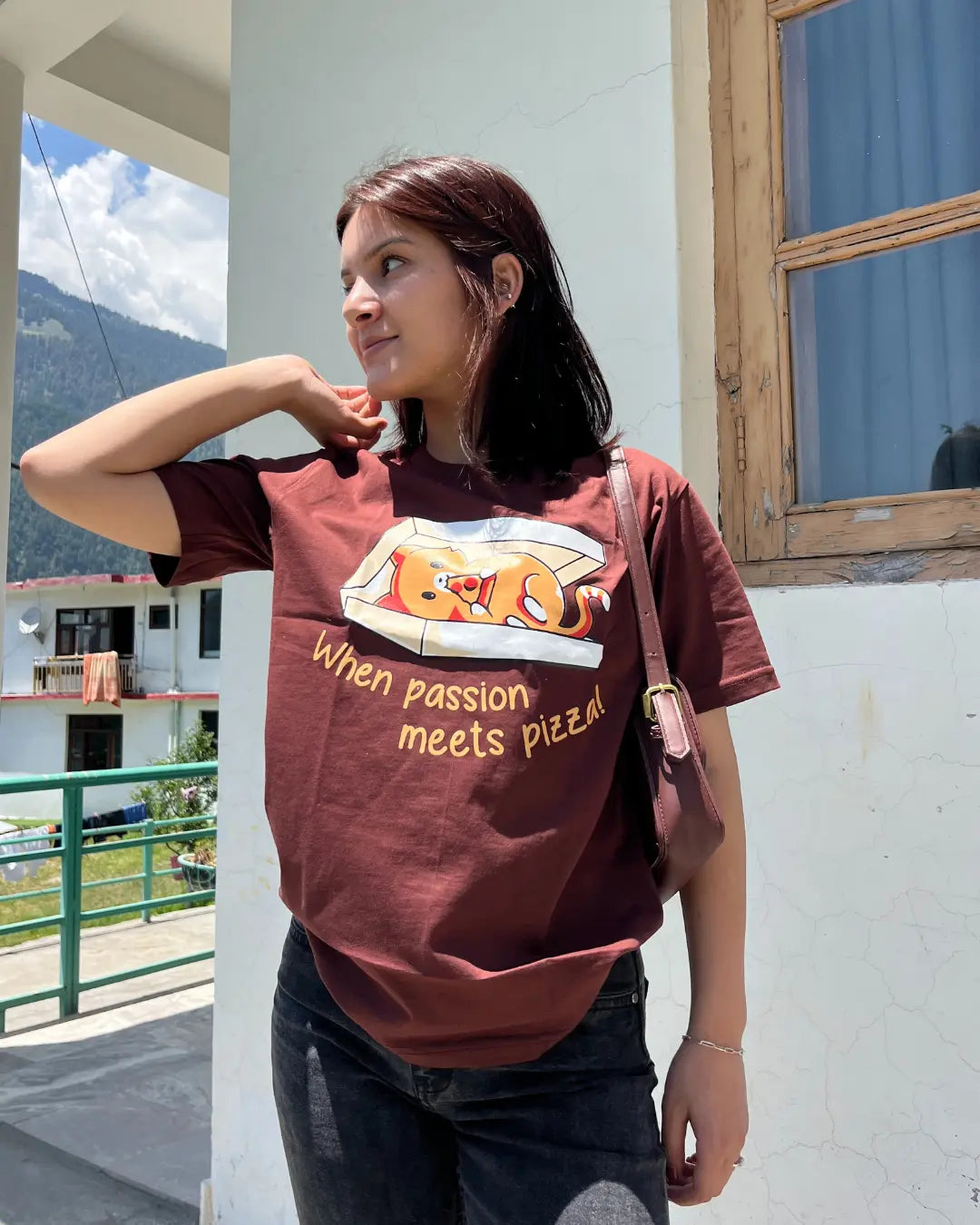When Passion Meets Pizza T-Shirt – maroon graphic tee with pizza illustration, worn by model.