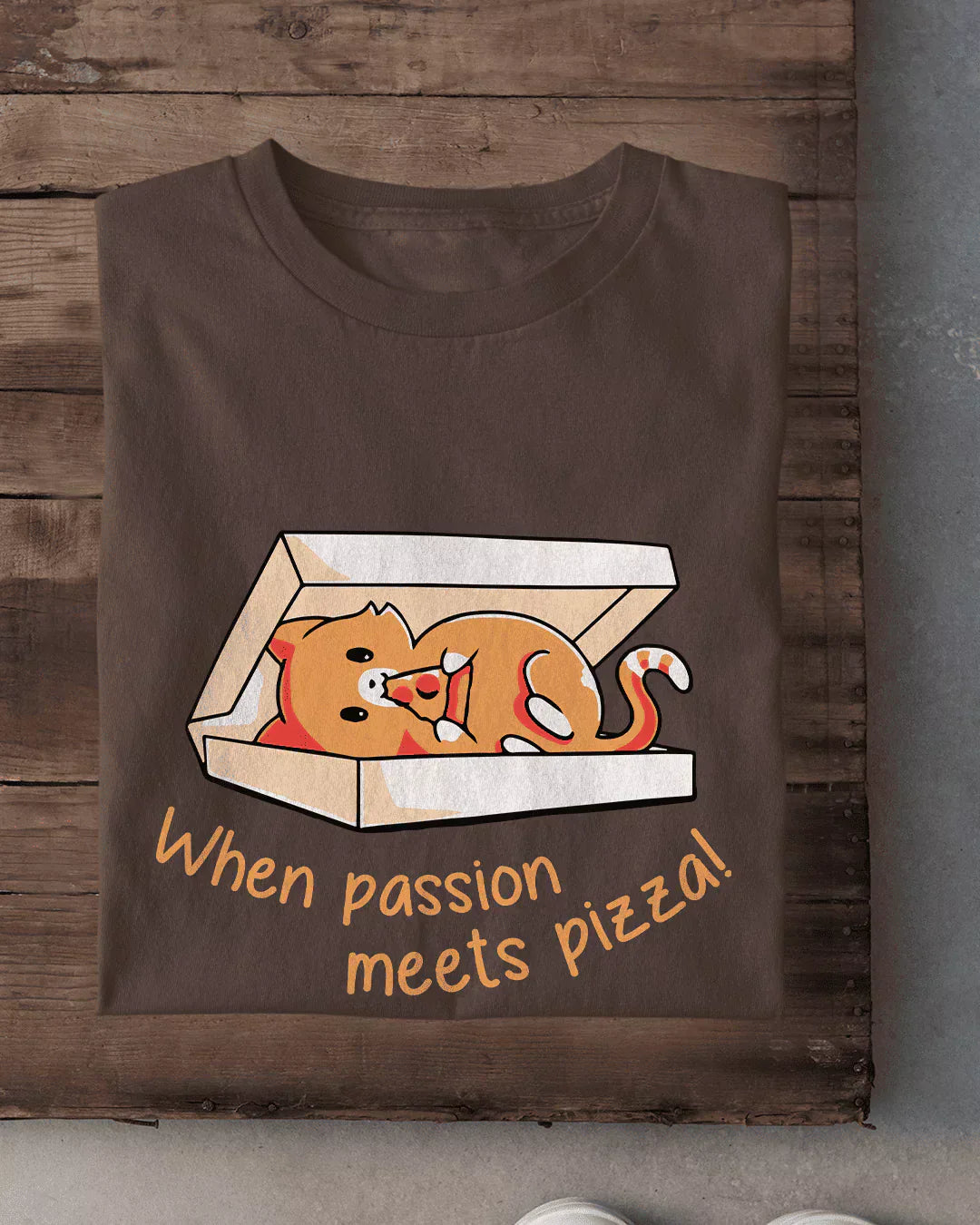 When Passion Meets Pizza T-Shirt - brown regular tee with a cartoon cat in a pizza box, flat lay