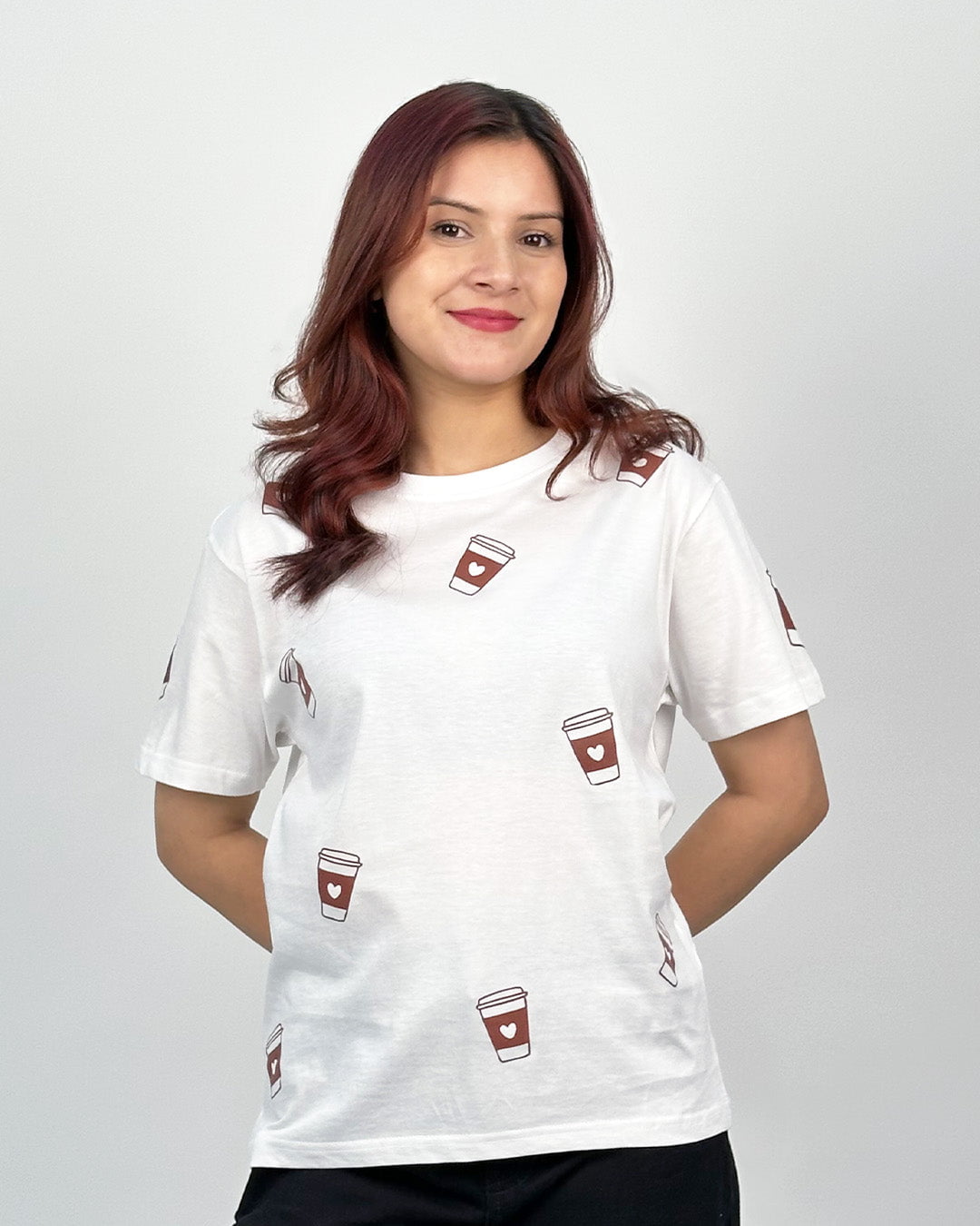 White Cappuccino T-Shirt – regular graphic tee with brown coffee cup prints, worn by model