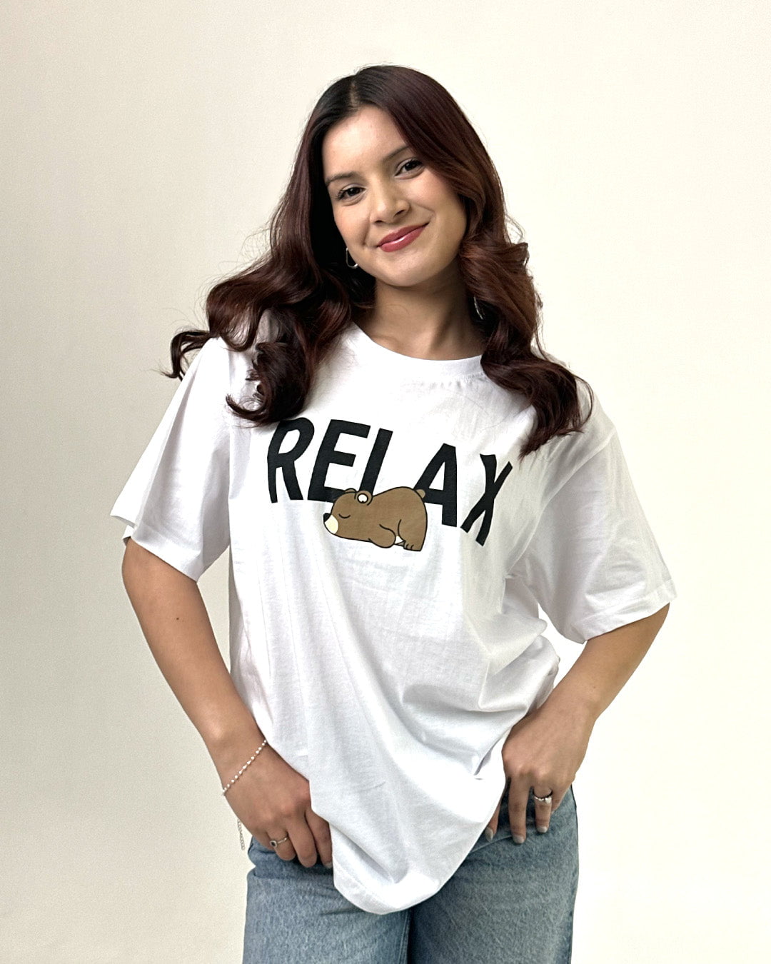 White Relax Oversized T-Shirt - oversized graphic tee with RELAX graphic featuring a brown animal, worn by model
